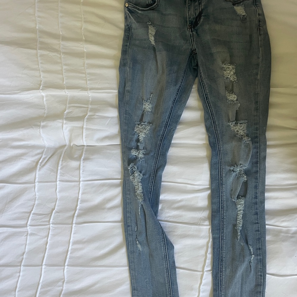 Women's Distressed Blue Jeans